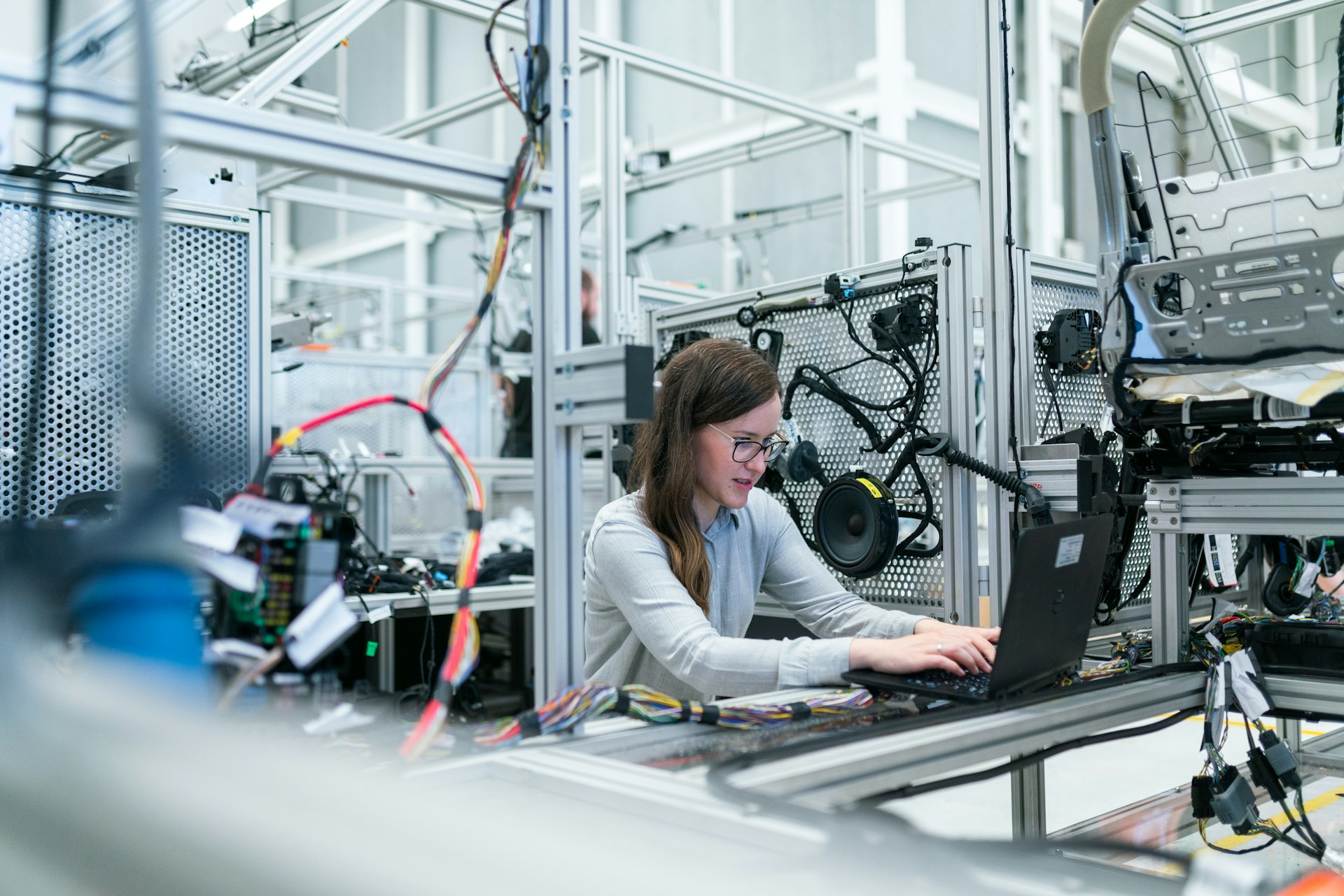 Engineer working on hardware in an industrial lab